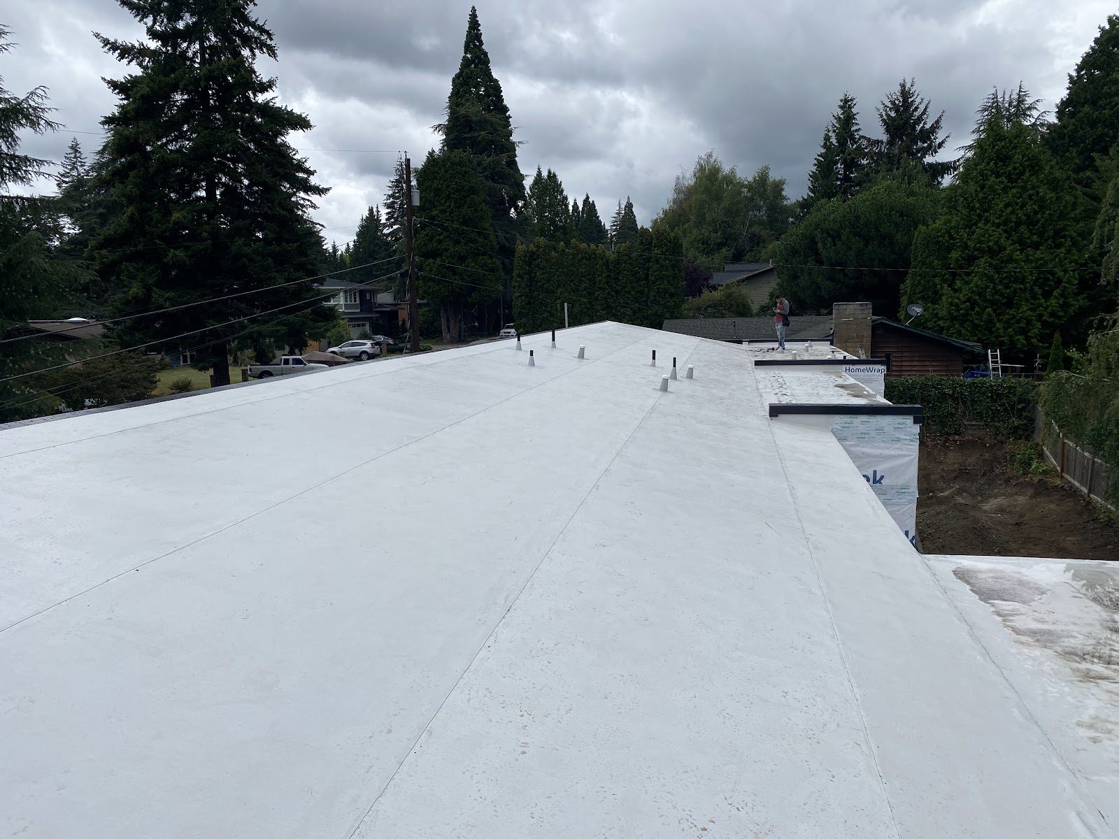 Wide white TPO membrane flat roof, fully sealed